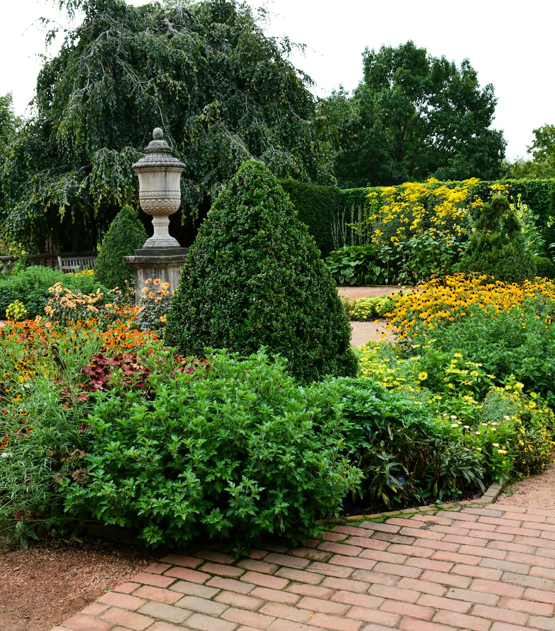 Formal garden with clipped topiary and layered planting